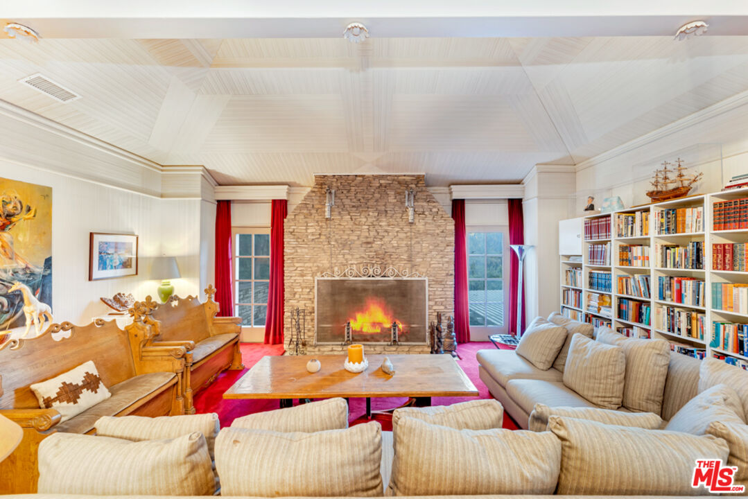 3405 Fryman Road Studio City, CA 91604 - Photo 13 of 28 a living room with furniture and a fireplace