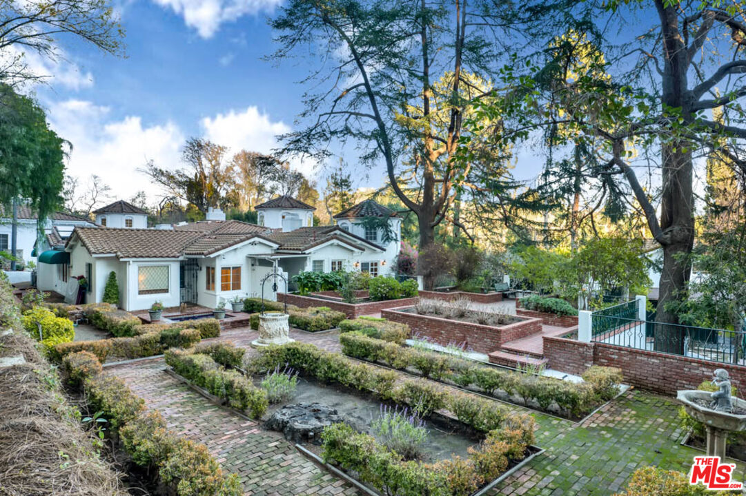 3405 Fryman Road Studio City, CA 91604 - Photo 19 of 28 a front view of a house with garden