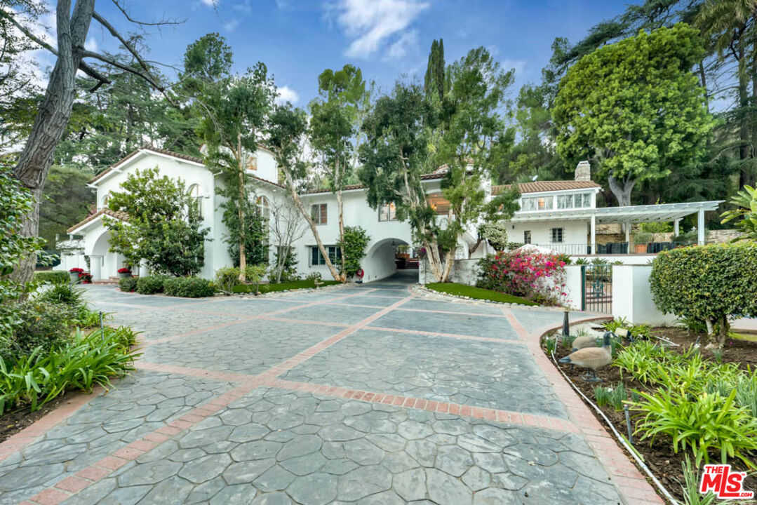 3405 Fryman Road Studio City, CA 91604 - Photo 24 of 28 a house with lots of trees in front of it