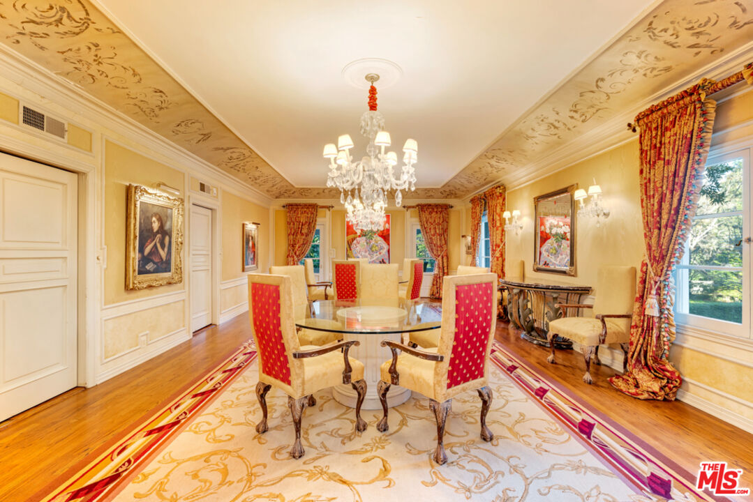 3405 Fryman Road Studio City, CA 91604 - Photo 4 of 28 a view of a dining room with furniture and a chandelier