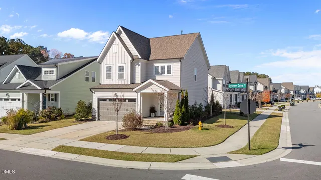 a front view of a house with yard