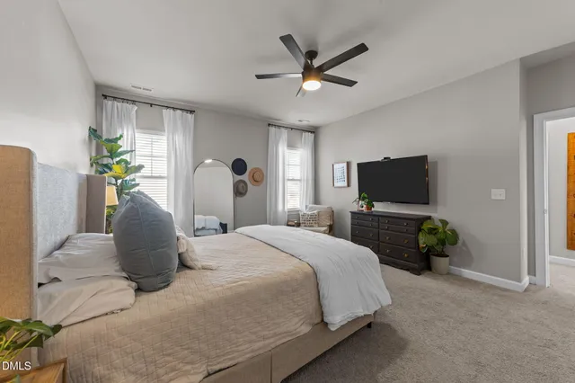 a bathroom with a double vanity sink mirror and shower