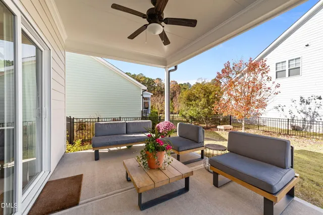 an aerial view of a house with a swimming pool