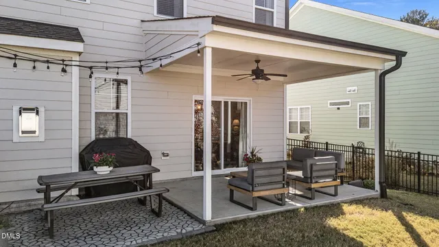 an aerial view of a house with a swimming pool
