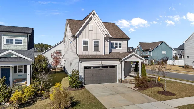 an aerial view of a house with swimming pool