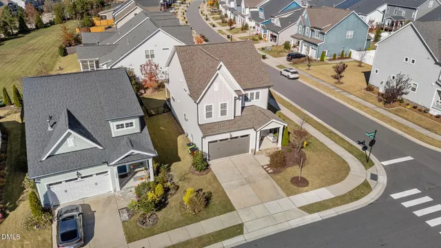 an aerial view of a house with swimming pool