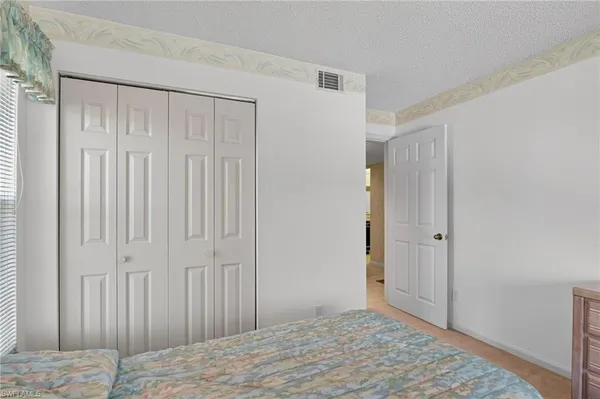 a view of a livingroom with wooden floor