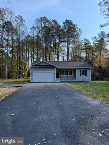 a front view of house with yard