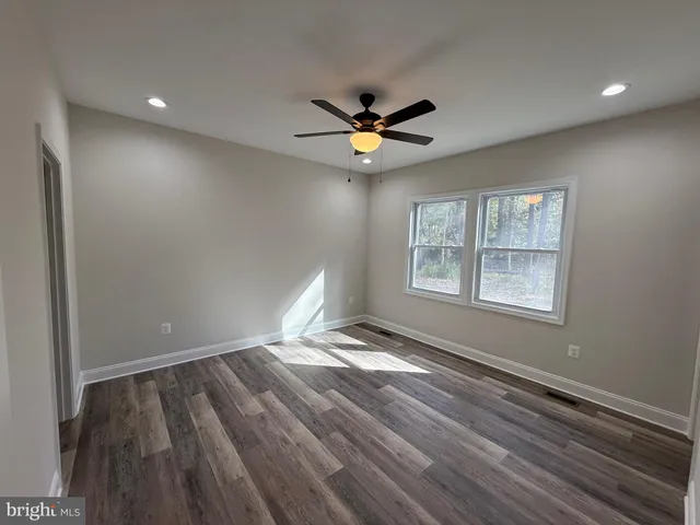 a view of a golf course with a big yard