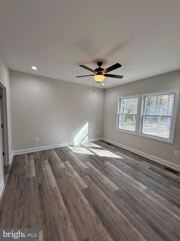 a view of a golf course with a lake