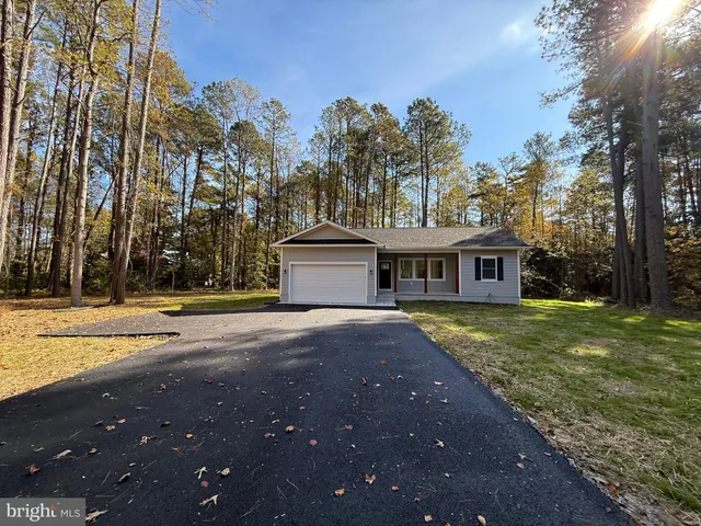 a view of a golf course with a lake