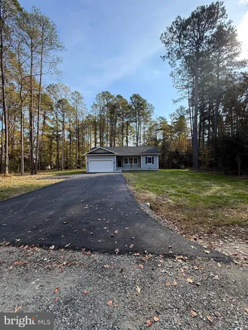 a view of a golf course with a lake
