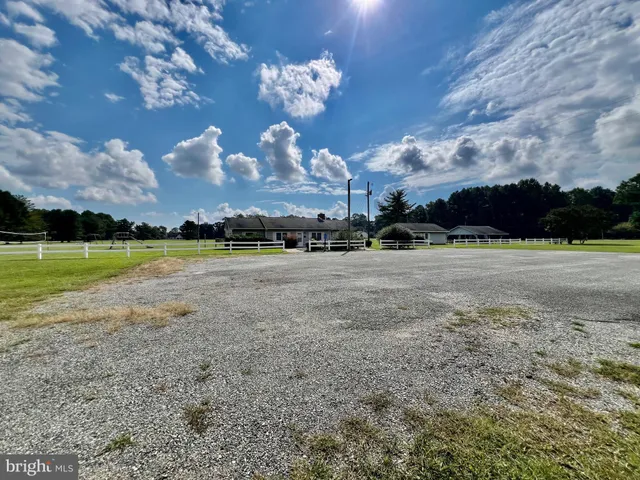 a view of a house with a big yard
