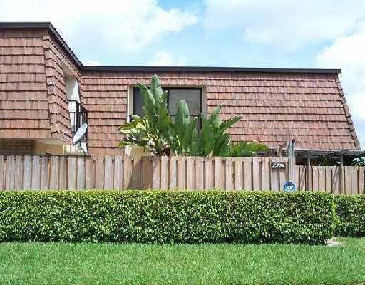 a view of a house with a garden