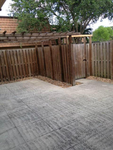 2909 29th Lane, Unit D Greenacres, FL 33463 - Photo 2 of 2 a view of wooden fence