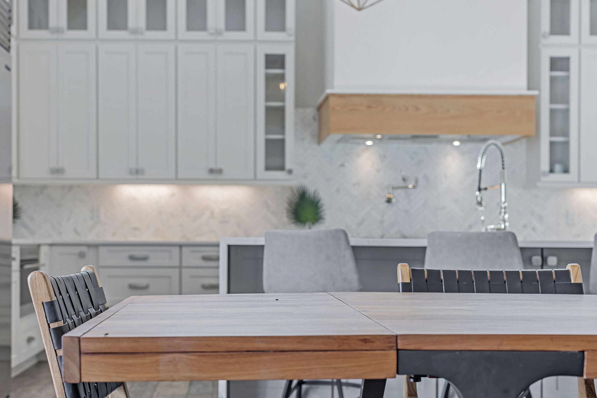 70 Bullard Road Santa Rosa Beach, FL 32459 - Photo 12 of 63 a kitchen with a table chairs and cabinets