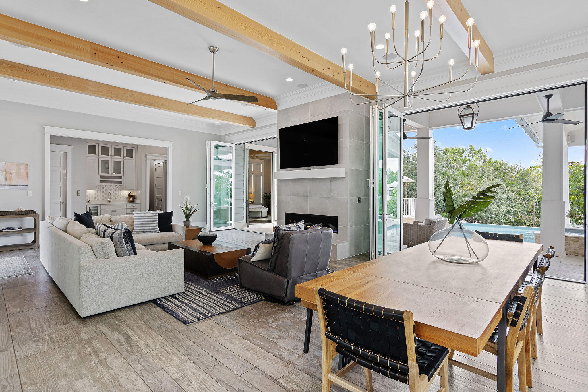 70 Bullard Road Santa Rosa Beach, FL 32459 - Photo 15 of 63 a living room with fireplace furniture and a flat screen tv