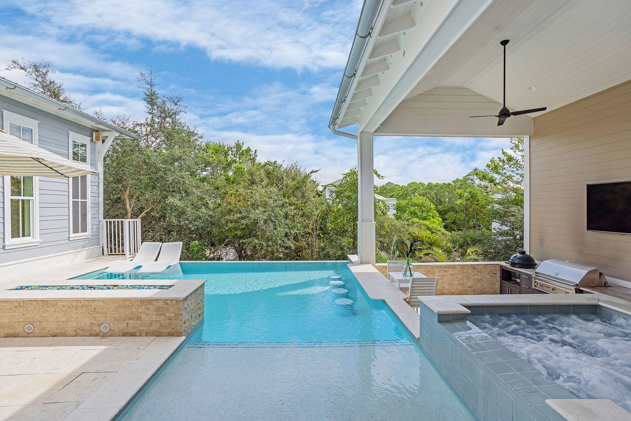 70 Bullard Road Santa Rosa Beach, FL 32459 - Photo 28 of 63 a view of a house with backyard and sitting area