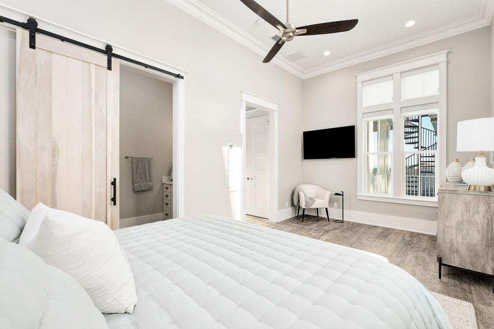 70 Bullard Road Santa Rosa Beach, FL 32459 - Photo 53 of 63 a bedroom with a bed window and couch