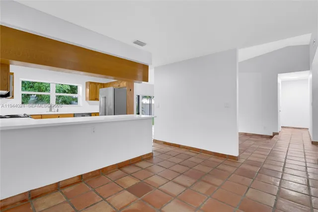 a living room with a large window