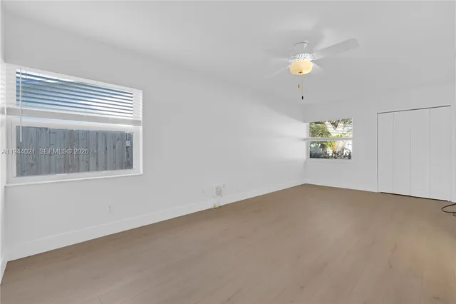 an empty room with windows