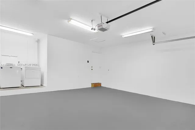 a outdoor living space with patio furniture and garden view