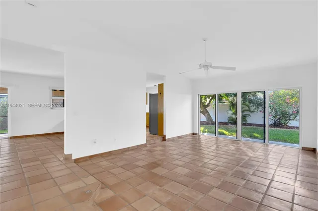 a view of empty room with windows