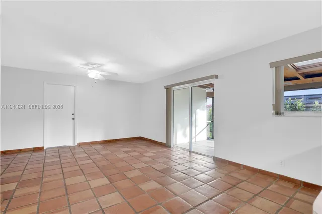 a view of an empty room and window