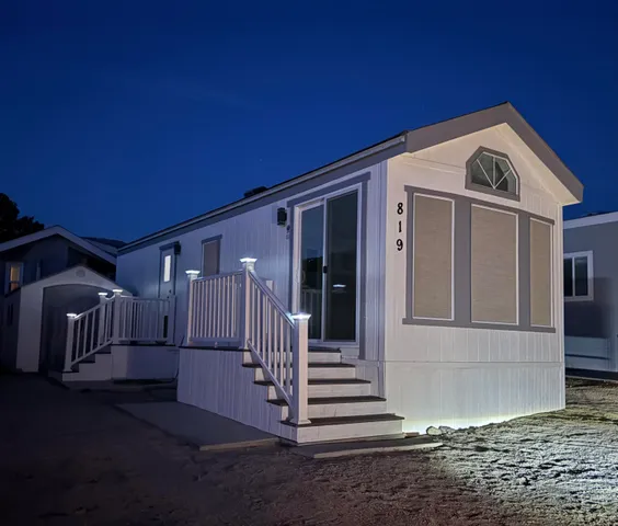 a view of a swimming pool with a lounge chairs