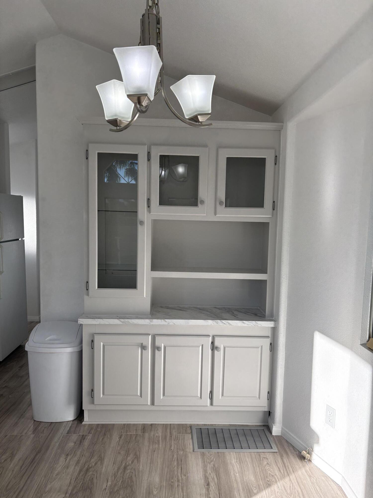 74711 Dillon Road, Unit 819 Desert Hot Springs, CA 92241 - Photo 6 of 41 a view of an empty room and wooden floor