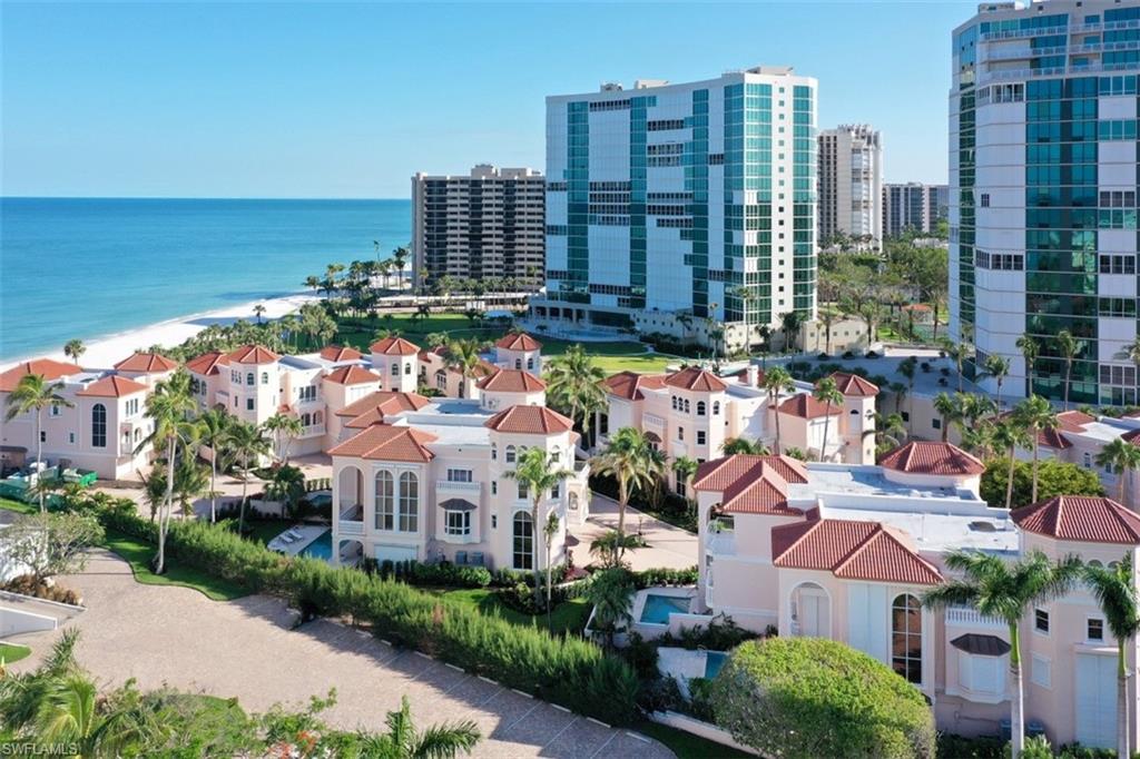 30 Casa Mar Lane Naples, FL 34103 - Photo 1 of 48 a view of a city with tall buildings
