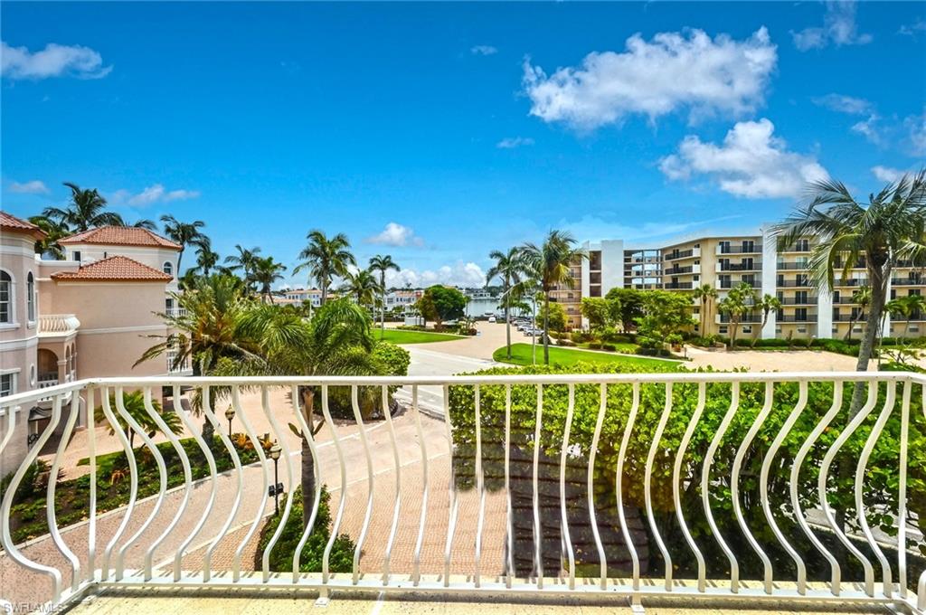 30 Casa Mar Lane Naples, FL 34103 - Photo 20 of 48 a view of swimming pool from a balcony