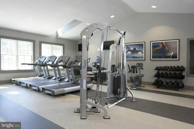 a picture of a bench in front of a building