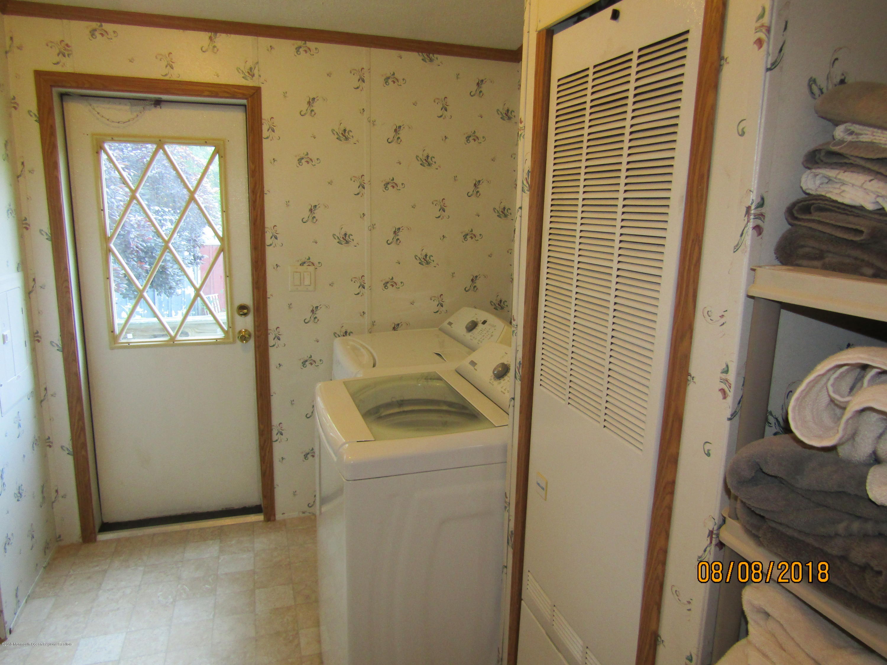 14 Kay Lane Howell, NJ 07731 - Photo 15 of 28 a utility room with a washer and dryer