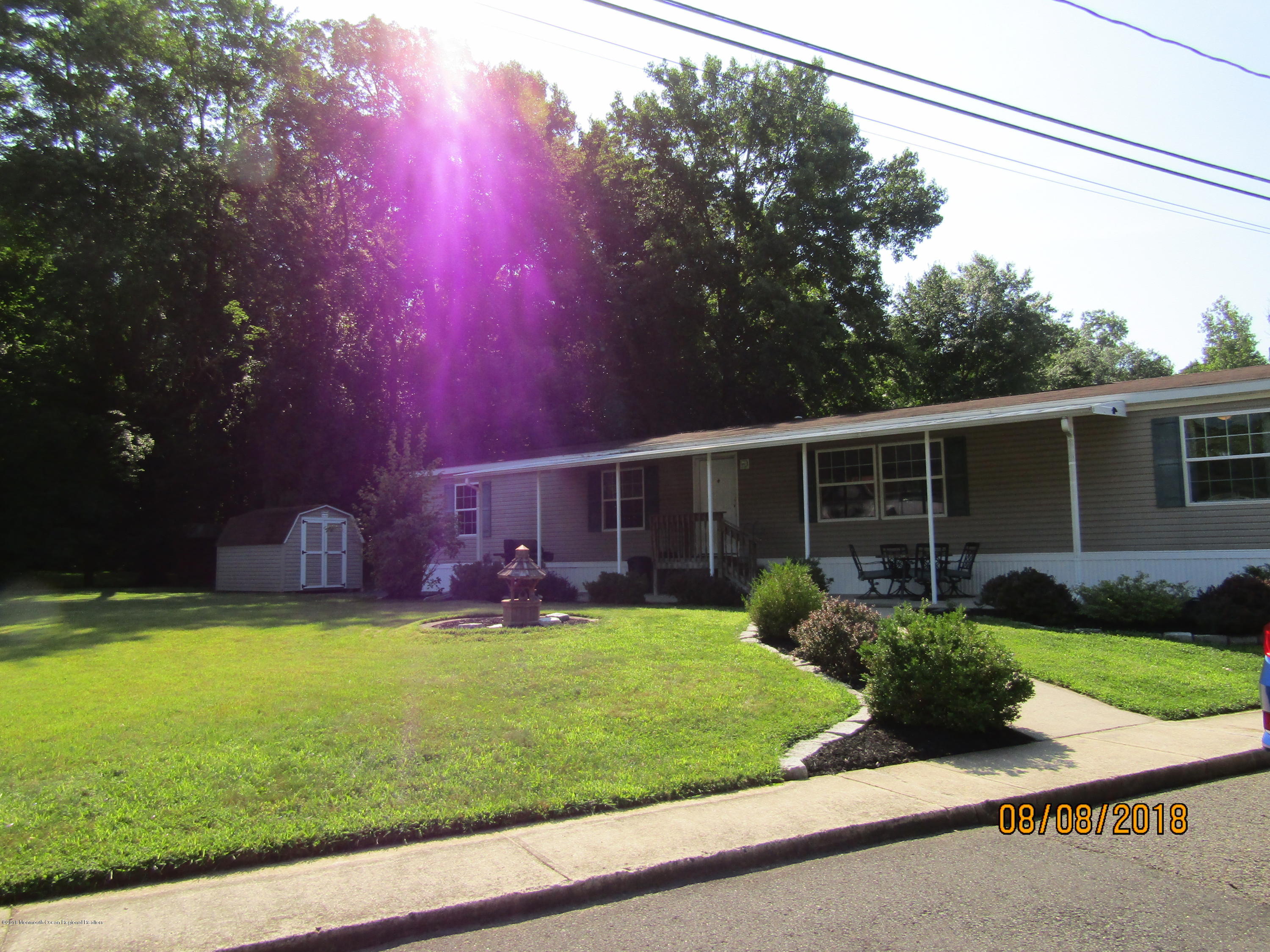 14 Kay Lane Howell, NJ 07731 - Photo 2 of 28 a view of a house with backyard and sitting area