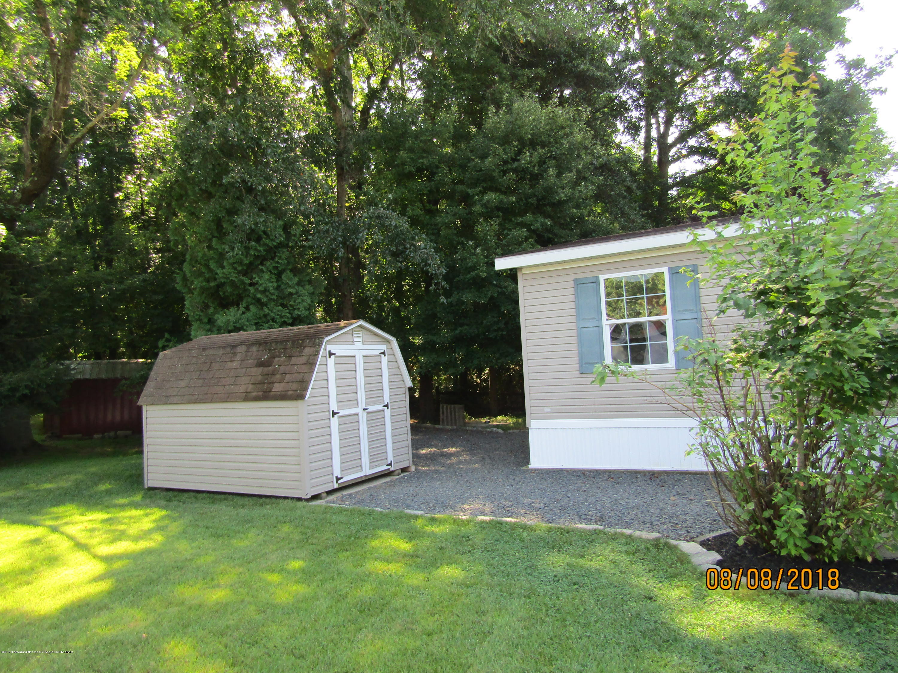 14 Kay Lane Howell, NJ 07731 - Photo 22 of 28 a view of backyard with a tub and stairs
