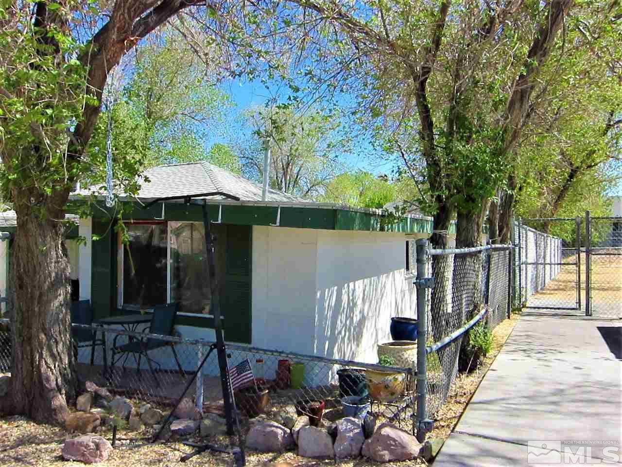 1931 Valley Road Reno, NV 89512 - Photo 12 of 20 a view of a chairs and table in the back yard