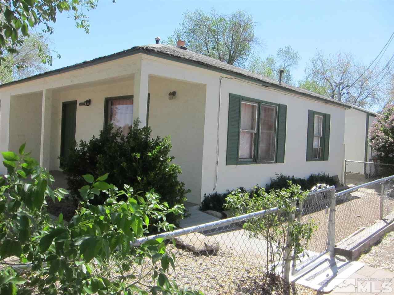 1931 Valley Road Reno, NV 89512 - Photo 2 of 20 a front view of a house with a yard