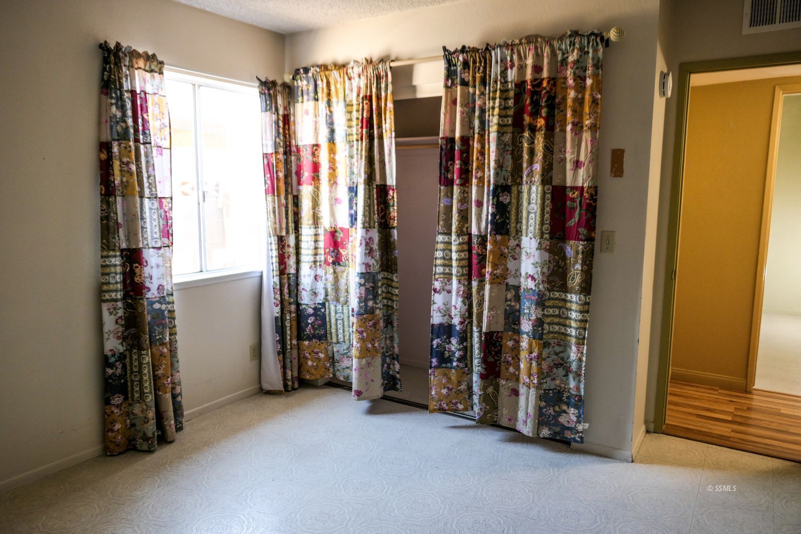 220 West Benson Avenue Ridgecrest, CA 93555 - Photo 27 of 38 a view of walk in closet with clothes