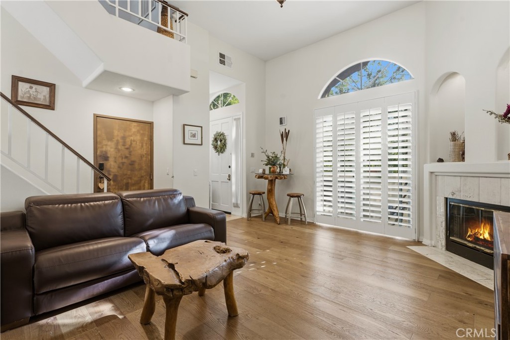 5340 Las Virgenes Road, Unit 11 Calabasas, CA 91302 - Photo 1 of 46 a living room with furniture and a fireplace