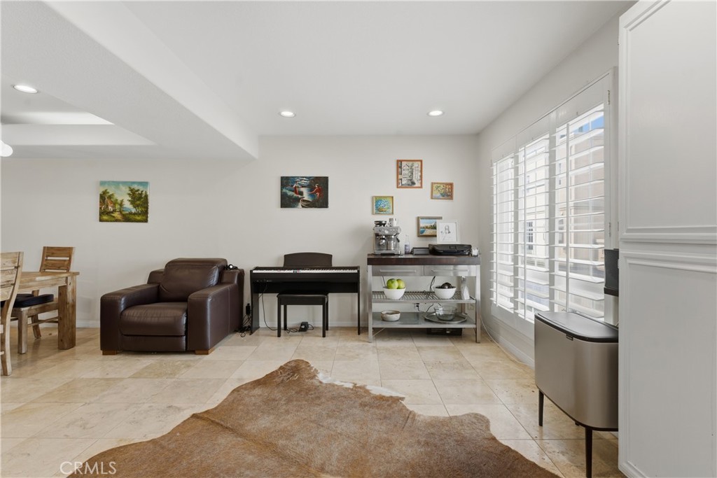 5340 Las Virgenes Road, Unit 11 Calabasas, CA 91302 - Photo 11 of 46 a living room with furniture and a window