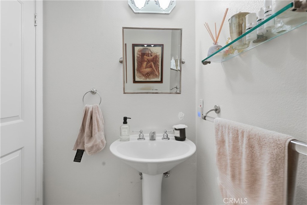5340 Las Virgenes Road, Unit 11 Calabasas, CA 91302 - Photo 17 of 46 a bathroom with a sink and a mirror