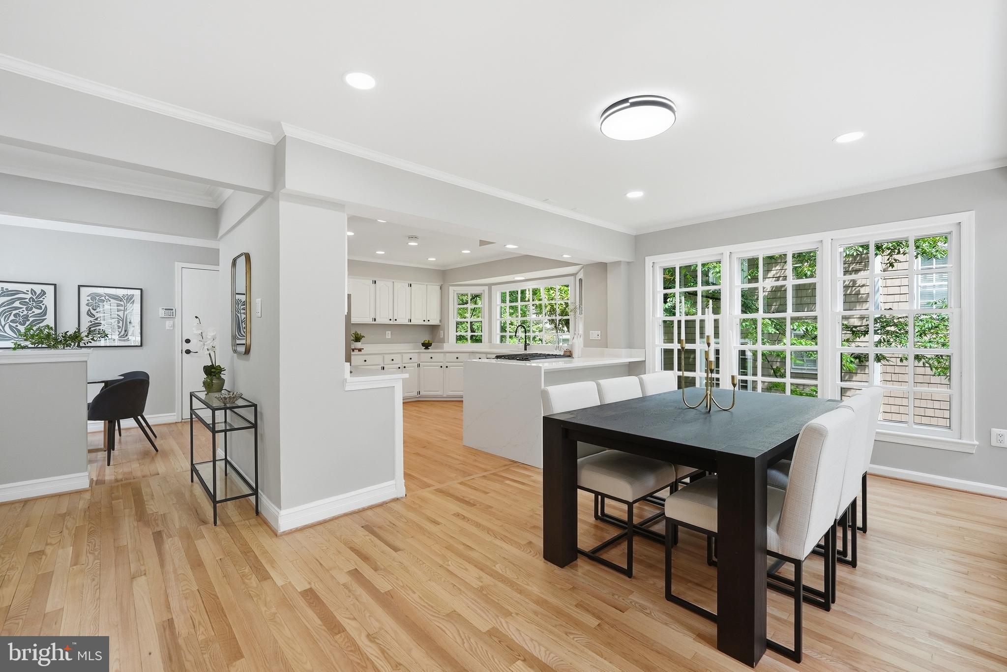 1291 Lamplighter Way Reston, VA 20194 - Photo 23 of 60 a view of a dining room with furniture and wooden floor