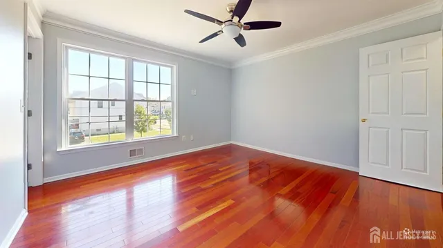 a bathroom with a shower toilet and sink