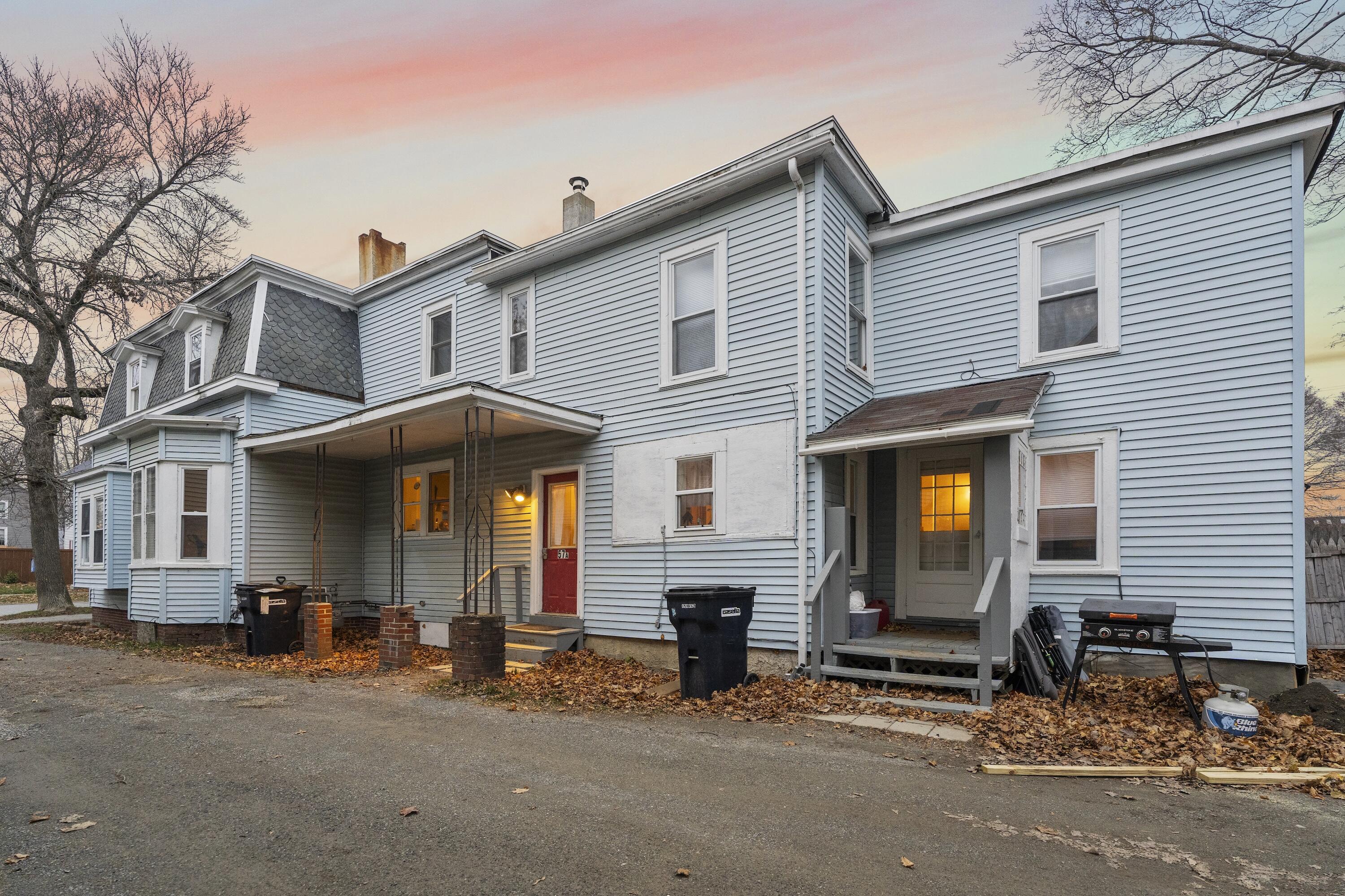 57 Elm Street Bangor, ME 04401 - Photo 3 of 49 side view of Duplex