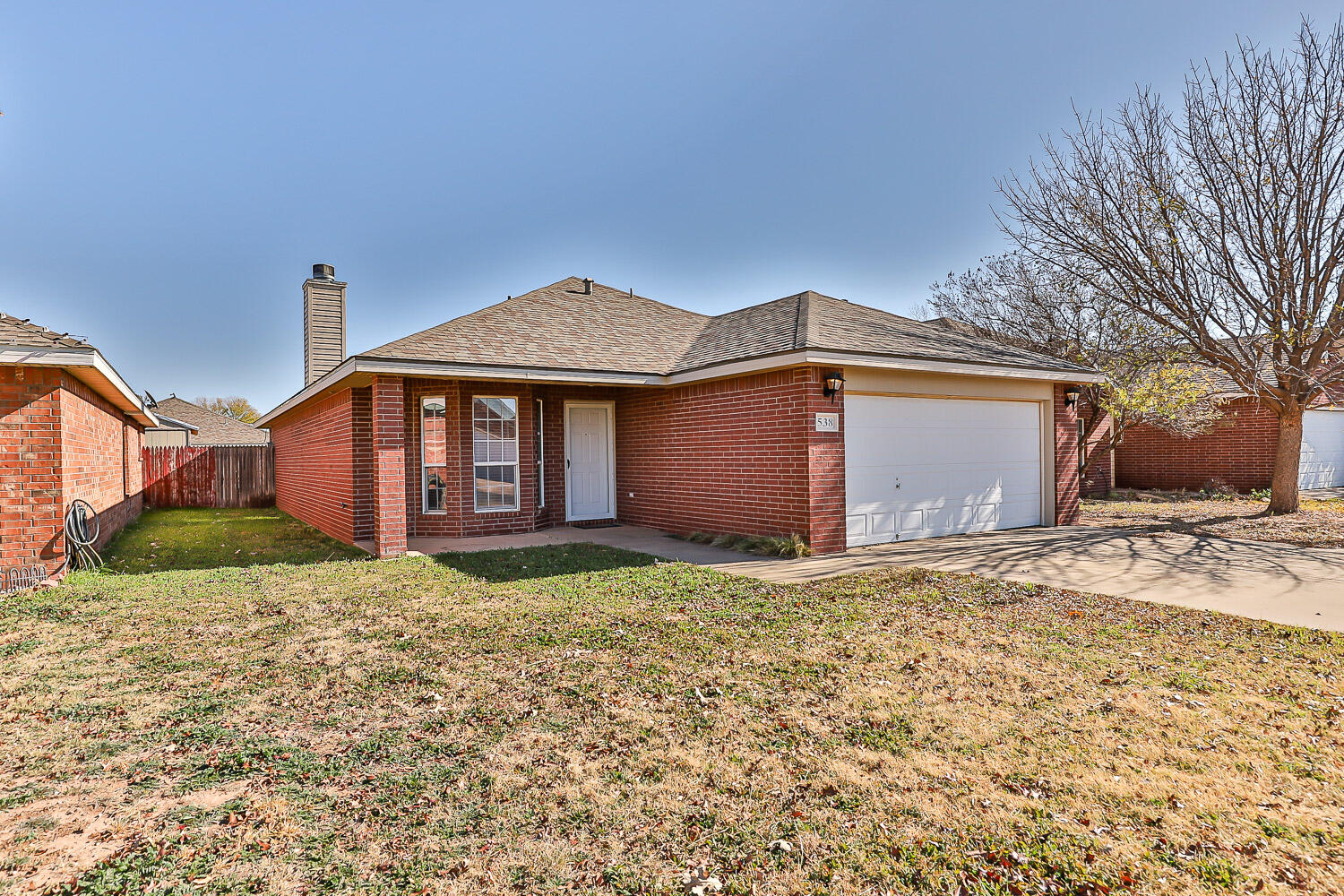 538 North Kirby Avenue Lubbock, TX 79416 - Photo 1 of 22 a front view of a house with garden