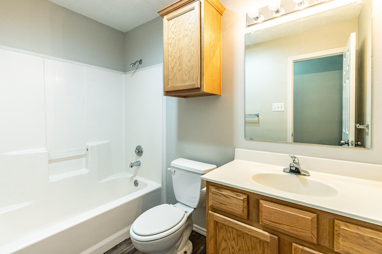 538 North Kirby Avenue Lubbock, TX 79416 - Photo 21 of 22 a bathroom with a sink a toilet and shower