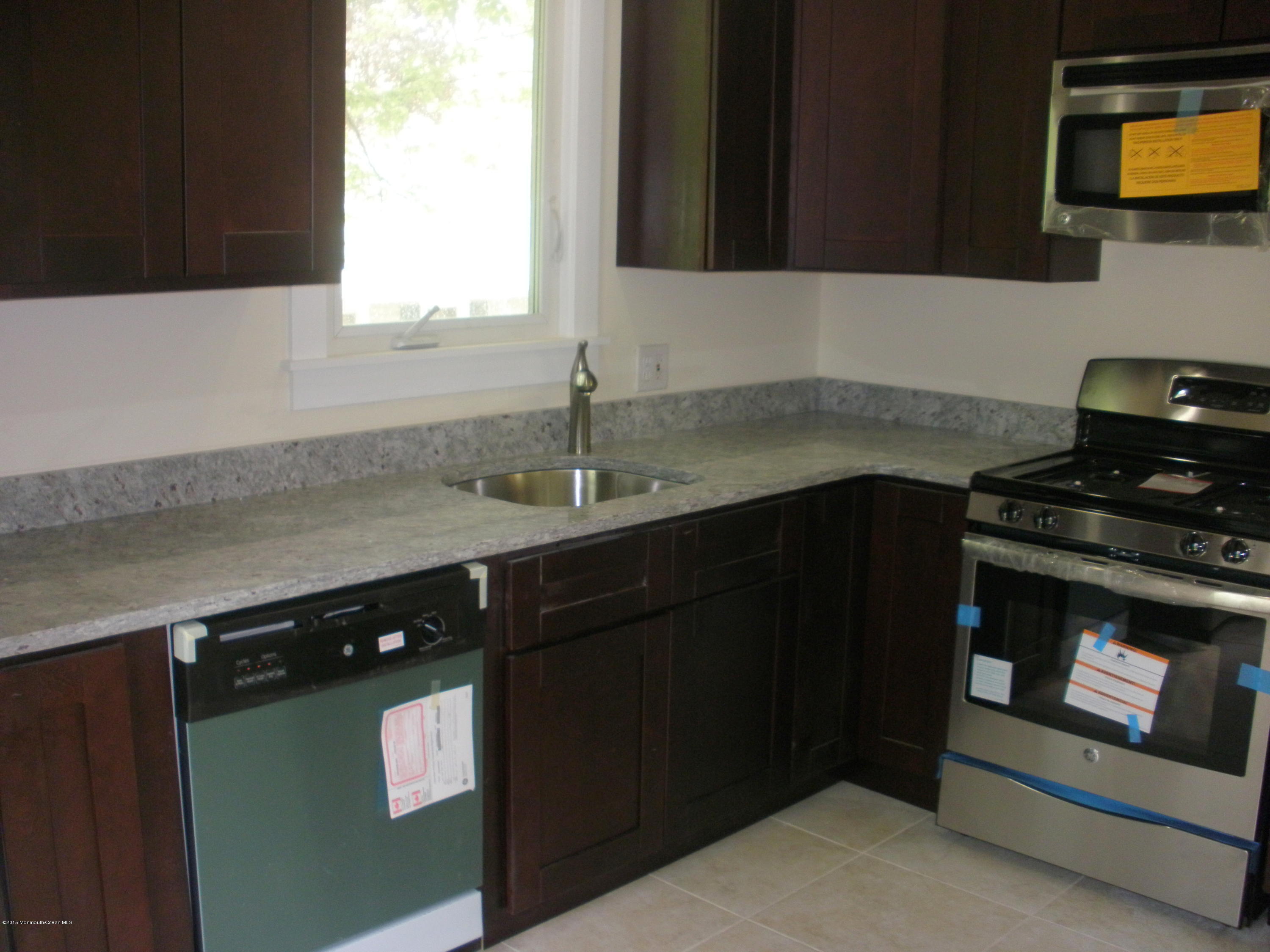 32 Tindall Road Middletown, NJ 07748 - Photo 2 of 15 Remodeled kitchen with granite counters