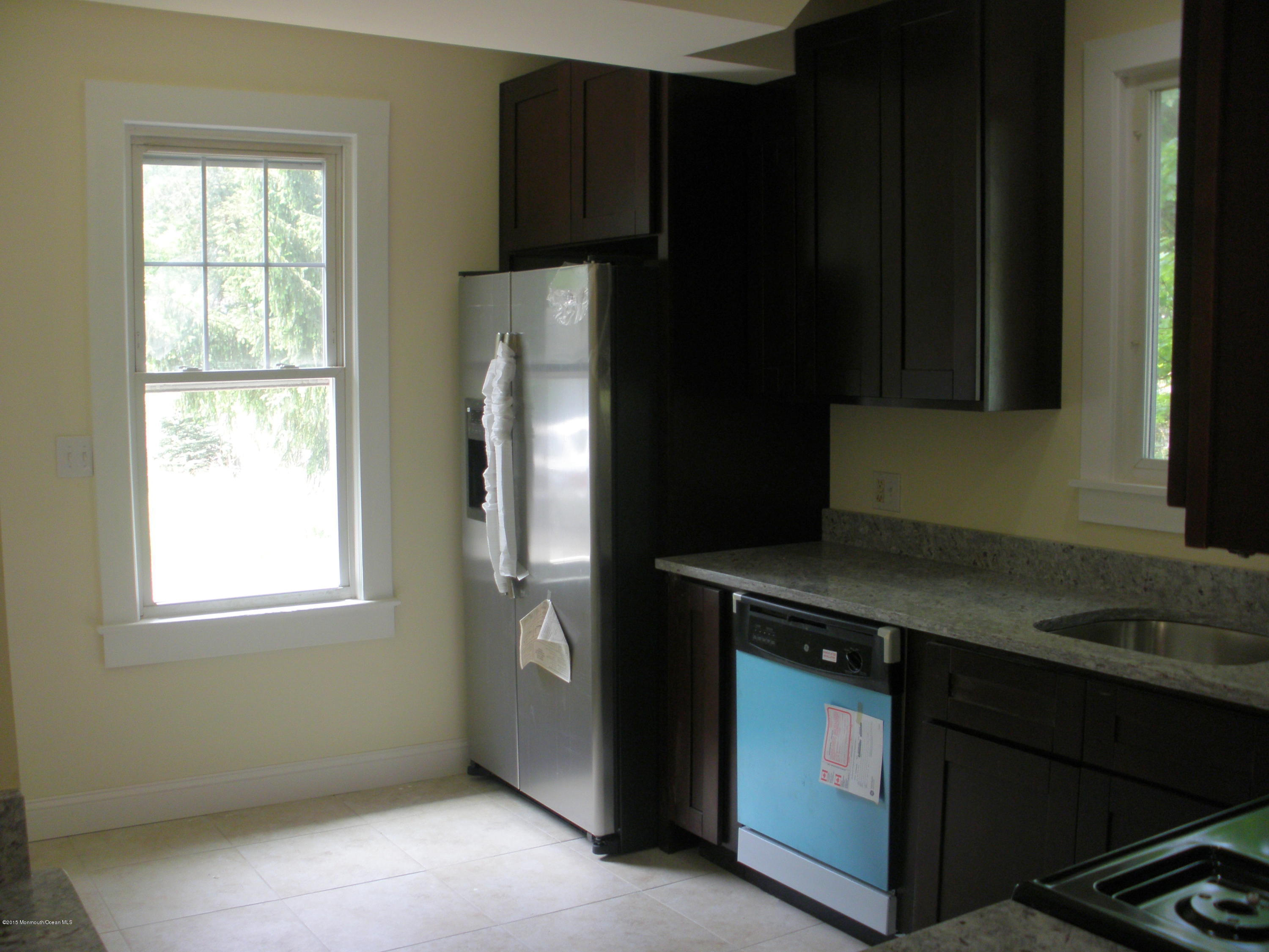 32 Tindall Road Middletown, NJ 07748 - Photo 4 of 15 Remodeled kitchen with 42 inch cabinets