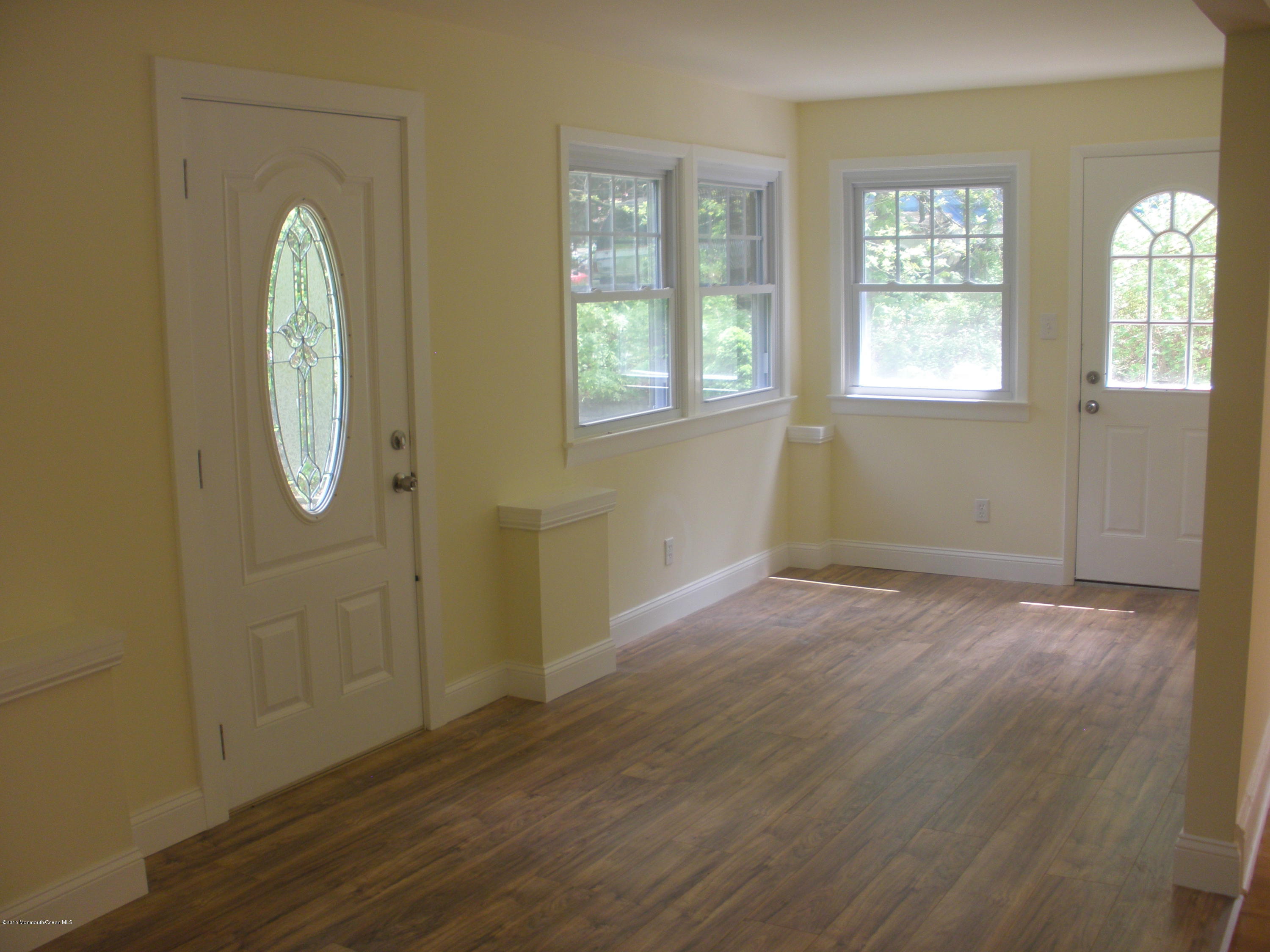 32 Tindall Road Middletown, NJ 07748 - Photo 9 of 15 Den at front of house